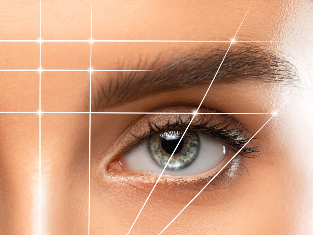 Permanent make-up for eyebrows of beautiful woman in beauty salon. Closeup beautician doing eyebrows tattooing. Collage before and after the procedure.